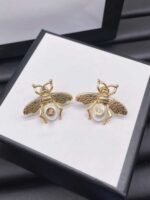gucci modeli vintage arı modeli incili antik gold gg küpe