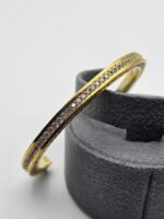 Celine modeli taşlı gold bileklik