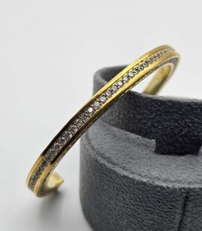 Celine modeli taşlı gold bileklik