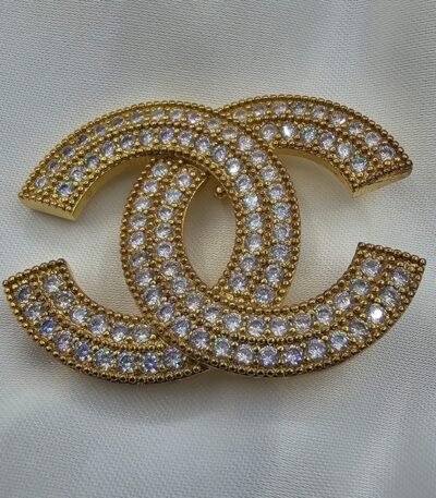 Chanel modeli taşlı gold cc broş