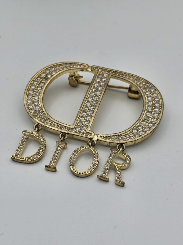 Dior modeli taşlı gold cd broş