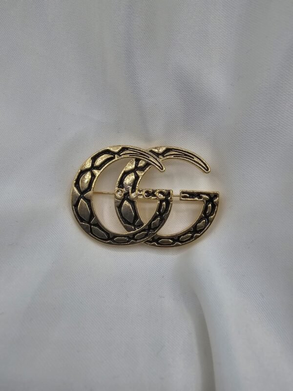 Gucci modeli antik gold gg broş