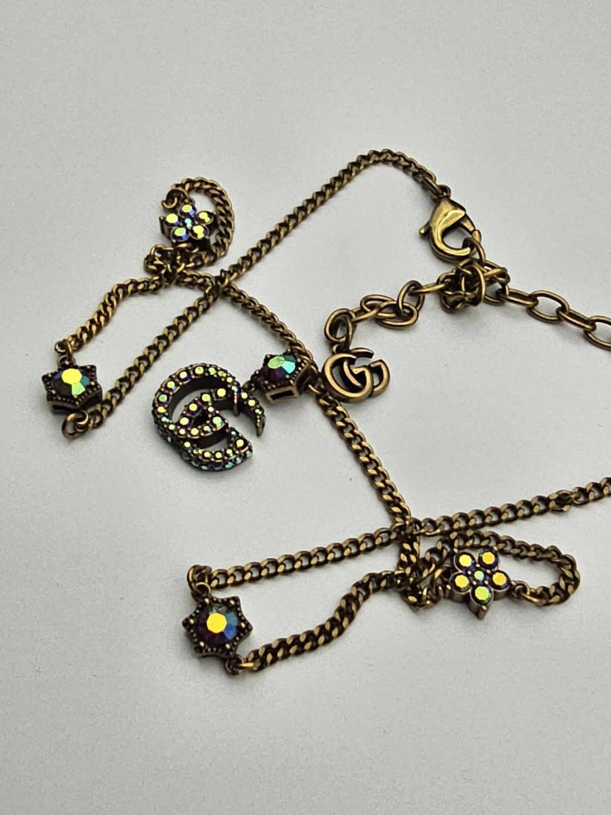 Gucci modeli renkli sedef taşlı antik gold gg kolye