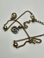 Gucci modeli renkli sedef taşlı antik gold gg kolye