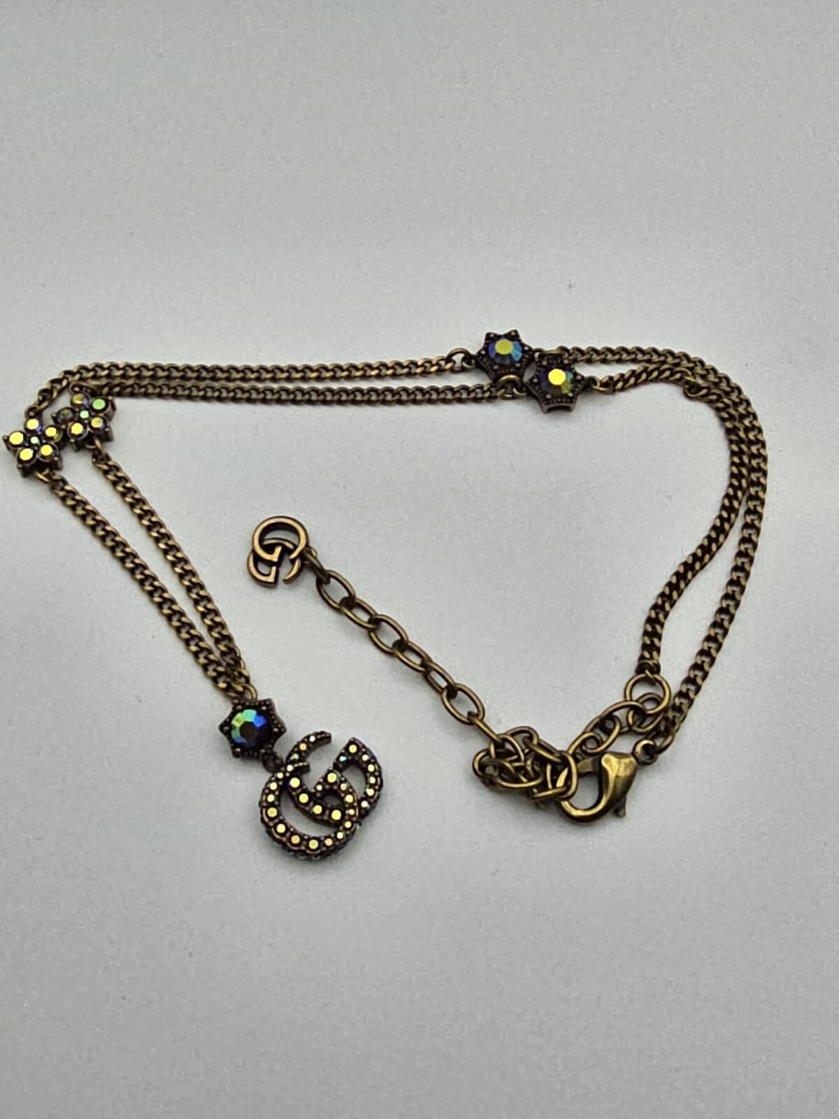 Gucci modeli renkli sedef taşlı antik gold gg kolye