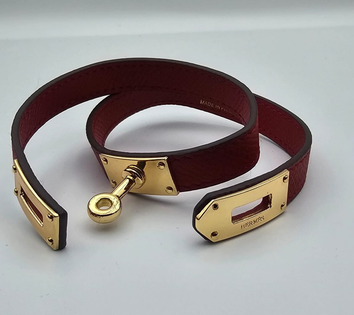 Hermes modeli kırmızı derili gold bileklik