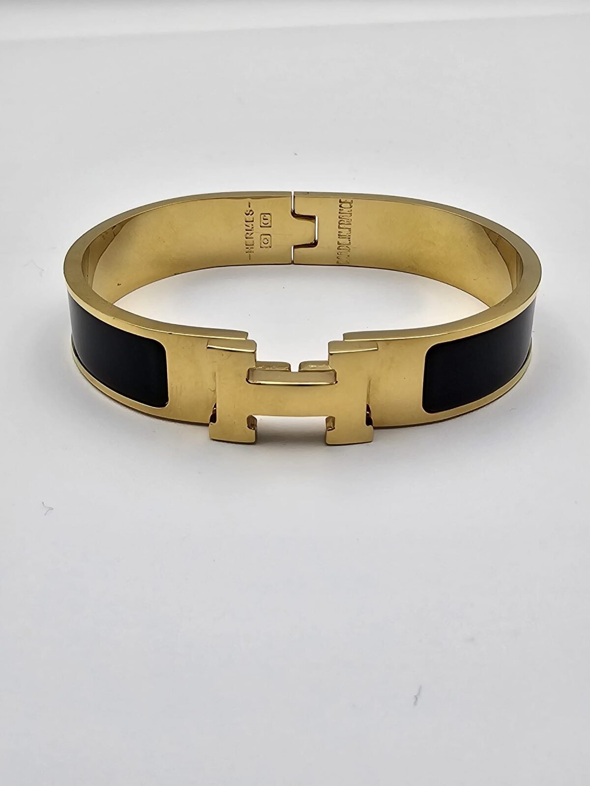 Hermes modeli siyah gold kelepçe h bileklik
