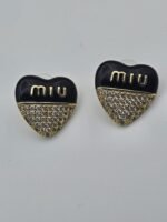 Miumiu modeli kalpli siyah mineli taşlı gold altın küpe