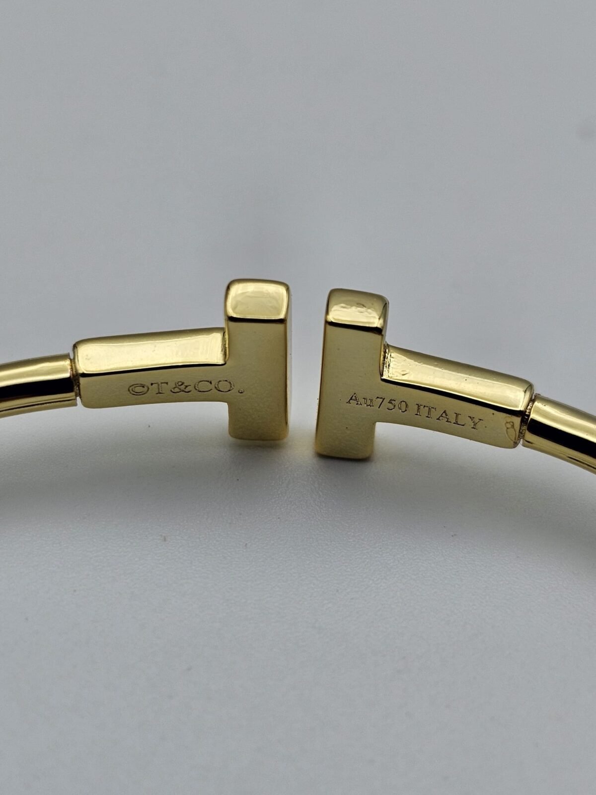 Tiffany modeli taşlı beyaz mineli gold bileklik