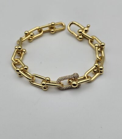 Tiffany modeli taşlı geçmeli zincir gold bileklik