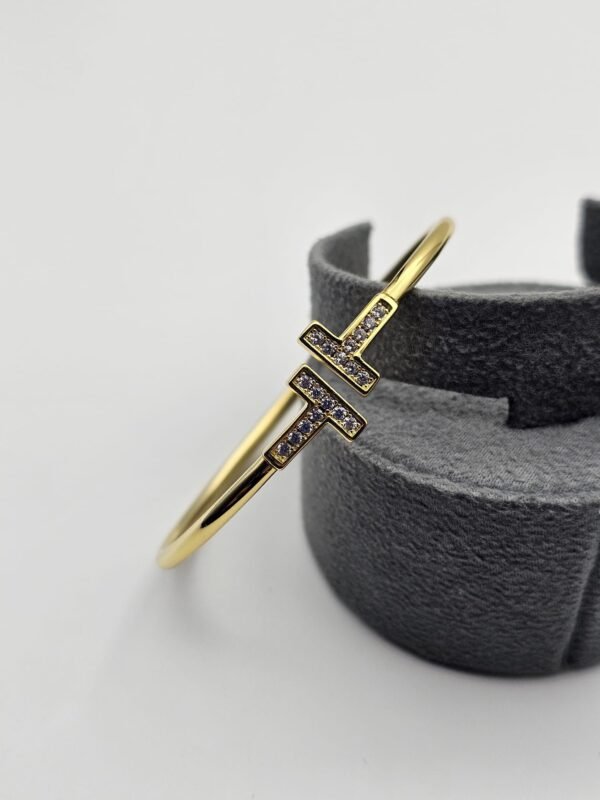 Tiffany modeli taşlı gold bileklik