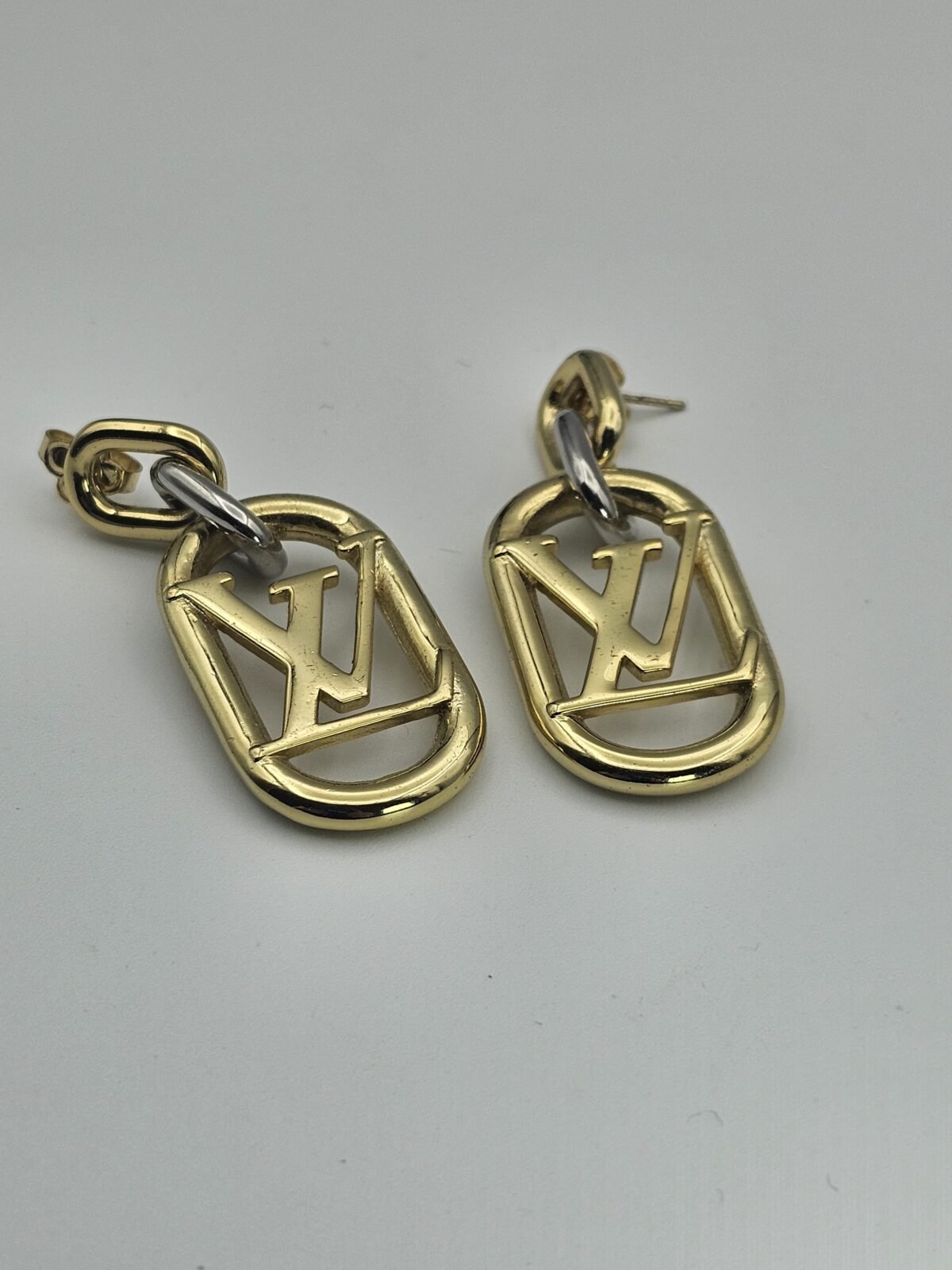 louis vuitton modeli oval altın lv küpe