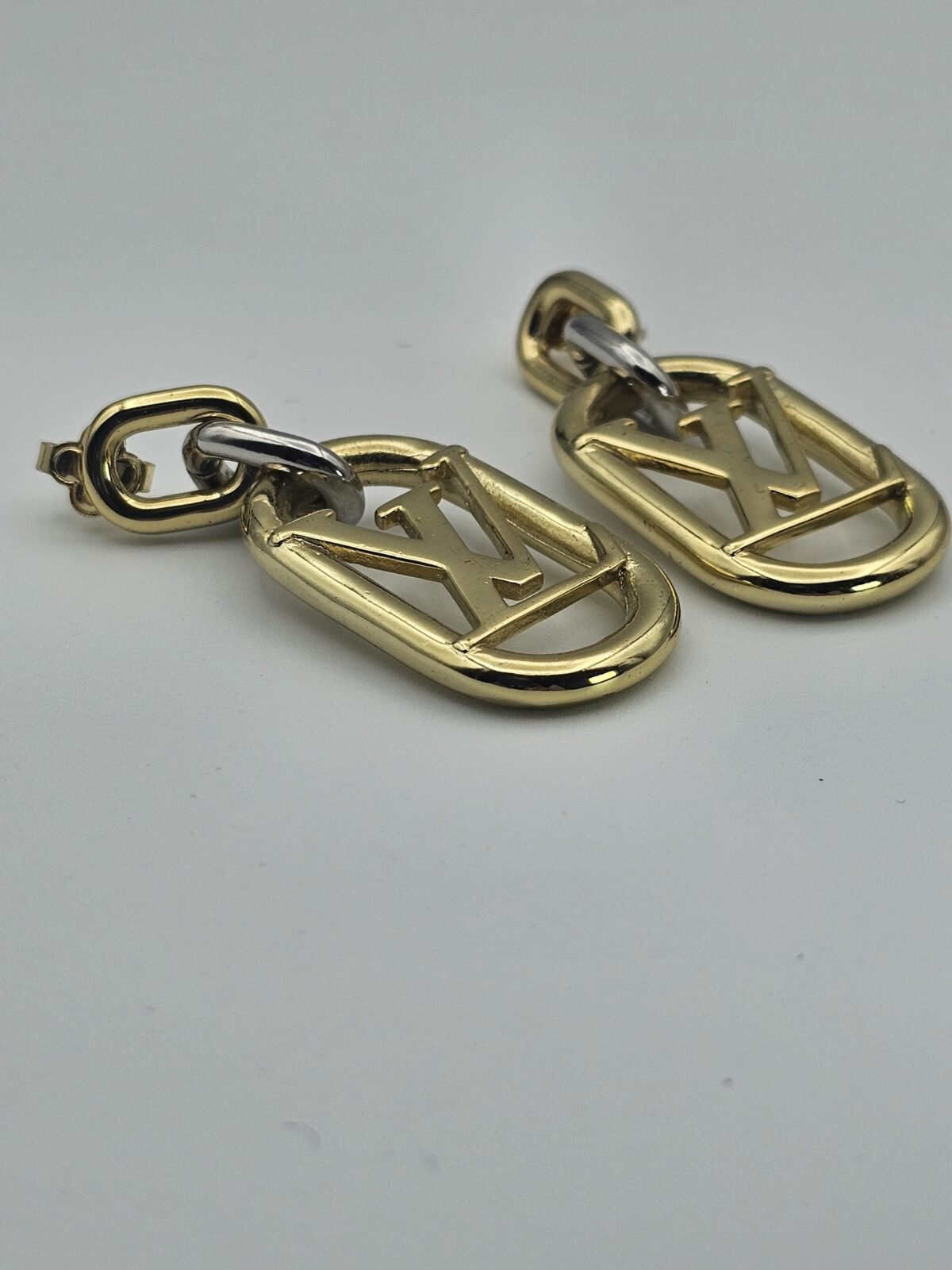 louis vuitton modeli oval altın lv küpe
